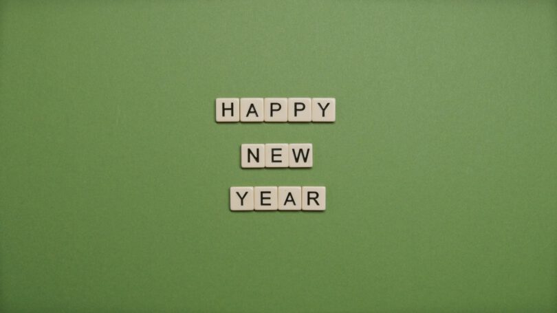 happy new year text on green background